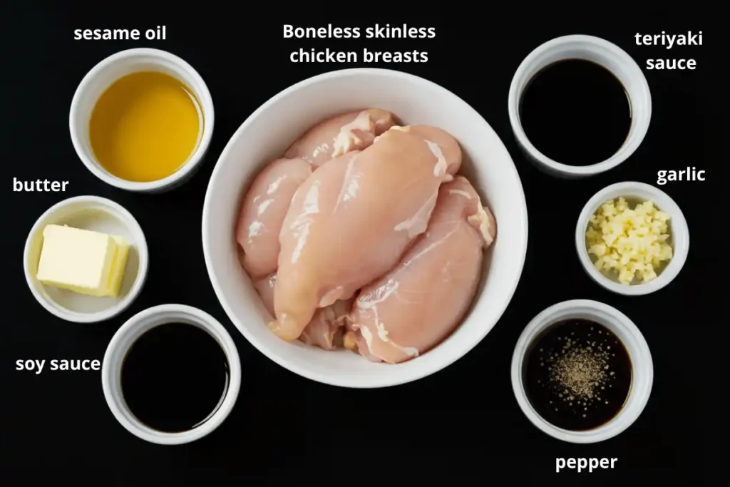Ingredients for hibachi chicken recipe displayed in prep bowls including chicken, butter, garlic, soy sauce, and teriyaki
